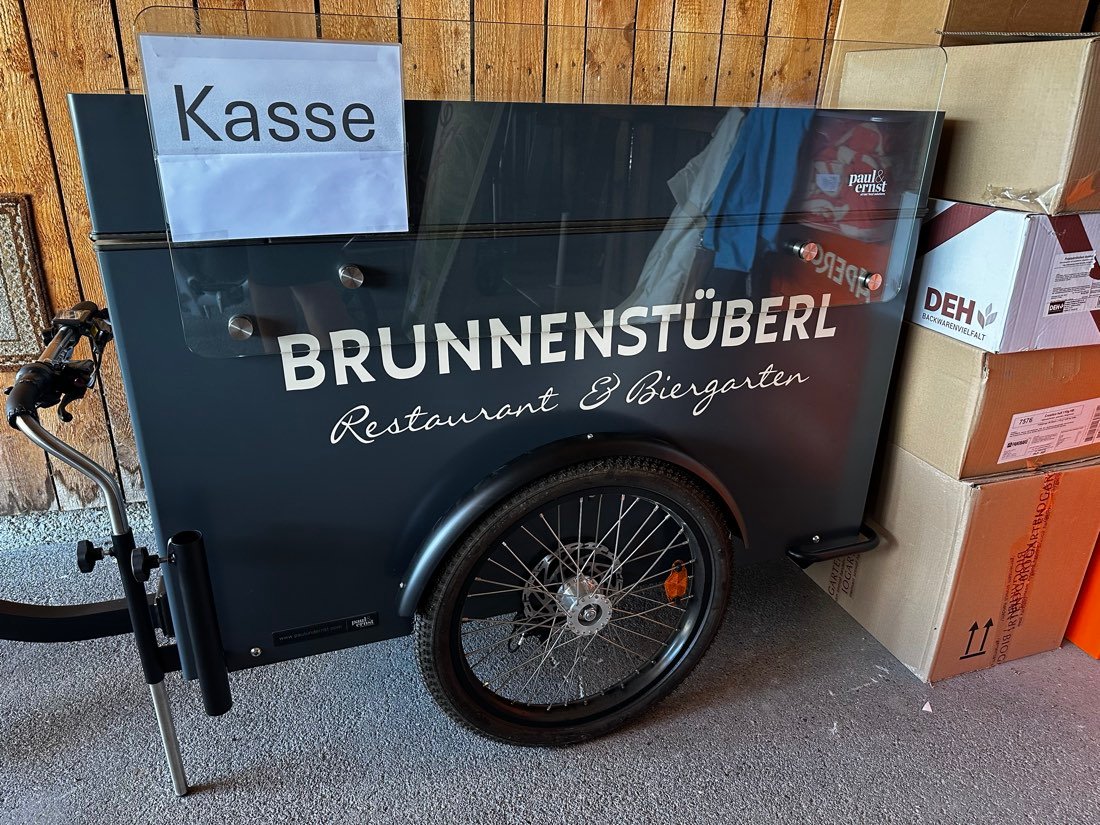 The lettered trailer in use as a mobile till